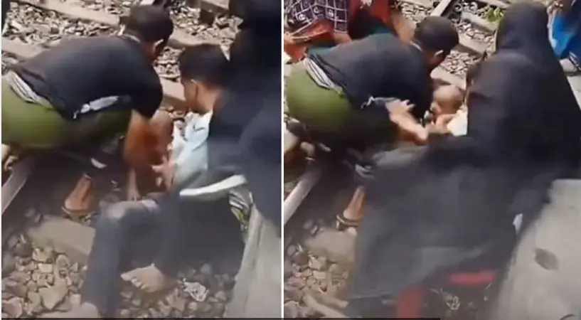 سانسیں روک دینے والا منظر: جب ایک نوجوان ٹرین کے نیچے موت اور بچے کے درمیان دیوار بن گیا